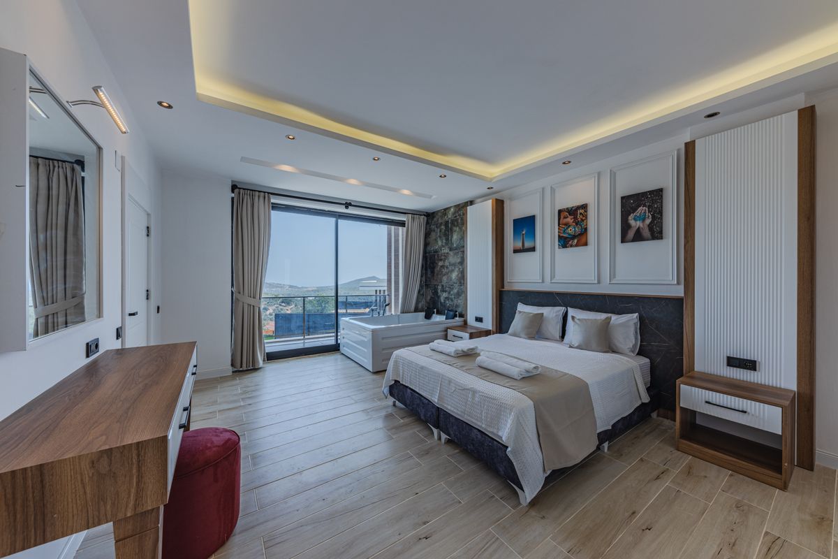 Illustrative suite with a private terrace and hot tub, not the actual property